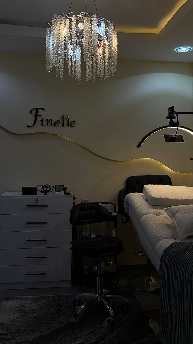 The Finelle Lash Extensions studio with its gold Finelle sign